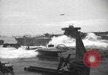 Image of concrete barges Normandy France, 1944, second 32 stock footage video 65675060370