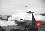 Image of concrete barges Normandy France, 1944, second 33 stock footage video 65675060370