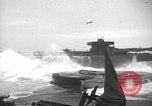 Image of concrete barges Normandy France, 1944, second 35 stock footage video 65675060370