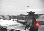 Image of concrete barges Normandy France, 1944, second 37 stock footage video 65675060370