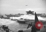 Image of concrete barges Normandy France, 1944, second 39 stock footage video 65675060370