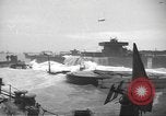Image of concrete barges Normandy France, 1944, second 40 stock footage video 65675060370