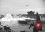 Image of concrete barges Normandy France, 1944, second 41 stock footage video 65675060370