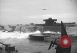 Image of concrete barges Normandy France, 1944, second 42 stock footage video 65675060370