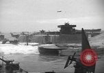 Image of concrete barges Normandy France, 1944, second 43 stock footage video 65675060370