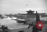 Image of concrete barges Normandy France, 1944, second 48 stock footage video 65675060370