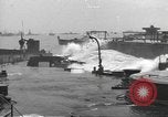 Image of concrete barges Normandy France, 1944, second 49 stock footage video 65675060370