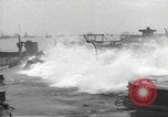 Image of concrete barges Normandy France, 1944, second 50 stock footage video 65675060370