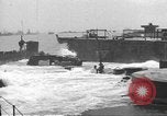 Image of concrete barges Normandy France, 1944, second 53 stock footage video 65675060370