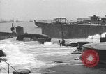 Image of concrete barges Normandy France, 1944, second 54 stock footage video 65675060370