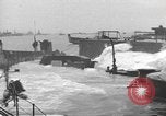 Image of concrete barges Normandy France, 1944, second 55 stock footage video 65675060370