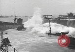 Image of concrete barges Normandy France, 1944, second 56 stock footage video 65675060370