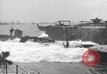 Image of concrete barges Normandy France, 1944, second 59 stock footage video 65675060370