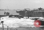 Image of concrete barges Normandy France, 1944, second 60 stock footage video 65675060370