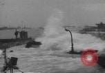 Image of concrete barges Normandy France, 1944, second 62 stock footage video 65675060370