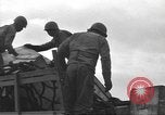 Standbild USA Soldaten Normandie Frankreich, 1944, aus Sekunde 34 historischem Filmmaterial Videoclip 65675060385