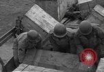 Standbild USA Soldaten Normandie Frankreich, 1944, aus Sekunde 45 historischem Filmmaterial Videoclip 65675060385