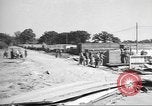 Image of Waco CG-4 gliders being assembled prior to D-Day England United Kingdom, 1944, second 18 stock footage video 65675060409