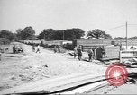 Image of Waco CG-4 gliders being assembled prior to D-Day England United Kingdom, 1944, second 21 stock footage video 65675060409