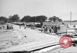 Image of Waco CG-4 gliders being assembled prior to D-Day England United Kingdom, 1944, second 22 stock footage video 65675060409