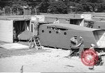 Image of Waco CG-4 gliders being assembled prior to D-Day England United Kingdom, 1944, second 47 stock footage video 65675060409