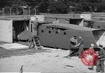 Image of Waco CG-4 gliders being assembled prior to D-Day England United Kingdom, 1944, second 48 stock footage video 65675060409