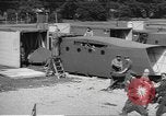 Image of Waco CG-4 gliders being assembled prior to D-Day England United Kingdom, 1944, second 49 stock footage video 65675060409