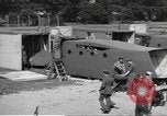 Image of Waco CG-4 gliders being assembled prior to D-Day England United Kingdom, 1944, second 50 stock footage video 65675060409