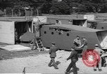 Image of Waco CG-4 gliders being assembled prior to D-Day England United Kingdom, 1944, second 51 stock footage video 65675060409