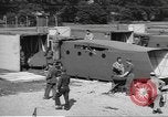 Image of Waco CG-4 gliders being assembled prior to D-Day England United Kingdom, 1944, second 53 stock footage video 65675060409