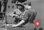 Image of Waco CG-4 gliders being assembled prior to D-Day England United Kingdom, 1944, second 57 stock footage video 65675060409