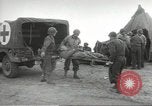 Image of US wounded soldiers being treated at field hospital Normandy France, 1944, second 22 stock footage video 65675060421