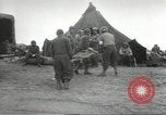 Image of US wounded soldiers being treated at field hospital Normandy France, 1944, second 26 stock footage video 65675060421