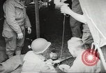 Image of US wounded soldiers being treated at field hospital Normandy France, 1944, second 31 stock footage video 65675060421