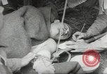 Image of US wounded soldiers being treated at field hospital Normandy France, 1944, second 38 stock footage video 65675060421