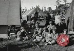 Image of US wounded soldiers being treated at field hospital Normandy France, 1944, second 42 stock footage video 65675060421