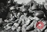 Image of US wounded soldiers being treated at field hospital Normandy France, 1944, second 46 stock footage video 65675060421
