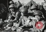 Image of US wounded soldiers being treated at field hospital Normandy France, 1944, second 49 stock footage video 65675060421