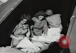 Image of US wounded soldiers being treated at field hospital Normandy France, 1944, second 56 stock footage video 65675060421