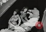 Image of US wounded soldiers being treated at field hospital Normandy France, 1944, second 59 stock footage video 65675060421