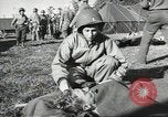 Image of US wounded soldiers being treated at field hospital Normandy France, 1944, second 62 stock footage video 65675060421