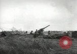 Image of U.S. field artillery firing at German targets in Normandy, France Normandy France, 1944, second 3 stock footage video 65675060424
