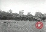 Image of U.S. field artillery firing at German targets in Normandy, France Normandy France, 1944, second 11 stock footage video 65675060424