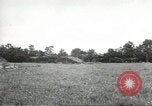 Image of U.S. field artillery firing at German targets in Normandy, France Normandy France, 1944, second 15 stock footage video 65675060424
