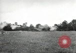 Image of U.S. field artillery firing at German targets in Normandy, France Normandy France, 1944, second 16 stock footage video 65675060424