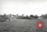 Image of U.S. field artillery firing at German targets in Normandy, France Normandy France, 1944, second 17 stock footage video 65675060424