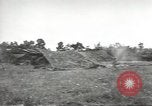 Image of U.S. field artillery firing at German targets in Normandy, France Normandy France, 1944, second 18 stock footage video 65675060424