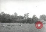 Image of U.S. field artillery firing at German targets in Normandy, France Normandy France, 1944, second 22 stock footage video 65675060424