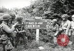 Image of United States troops greeted by French civilians Sainte-Marie-du-Mont France, 1944, second 3 stock footage video 65675060425
