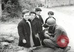 Image of United States troops greeted by French civilians Sainte-Marie-du-Mont France, 1944, second 11 stock footage video 65675060425